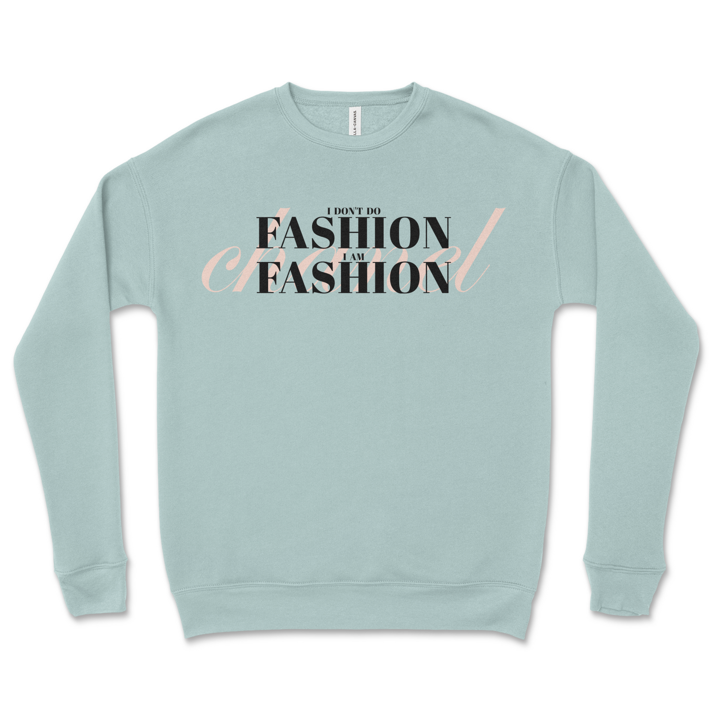 Light blue sweatshirt with text 'I don't do fashion, I am fashion' on a white background